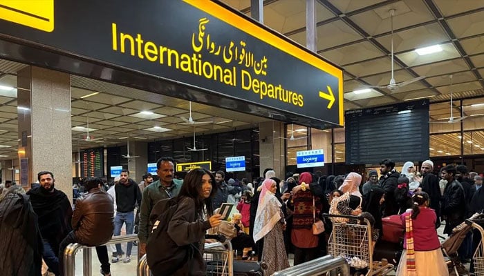 A student leaving for the United States at Jinnah International Airport, Karachi, Pakistan, on January 21, 2023.