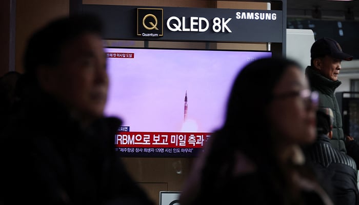 People watch a TV broadcasting a news report on North Korea firing a ballistic missile out to sea off its east coast, in Seoul, South Korea, January 6, 2025. — Reuters