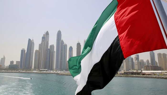 UAE flag flies over a boat at Dubai Marina, Dubai, United Arab Emirates May 22, 2015. — Reuters