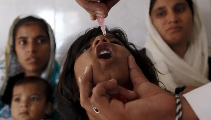 A child receiving polio drops in Pakistan. — Reuters/File