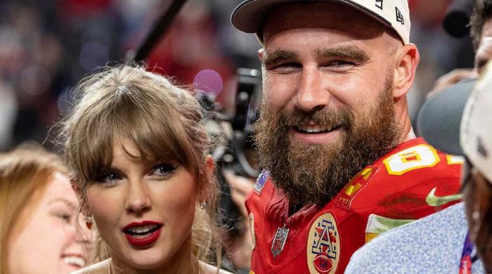 Travis Kelce performs coy discussing NYE plans with Taylor Swift