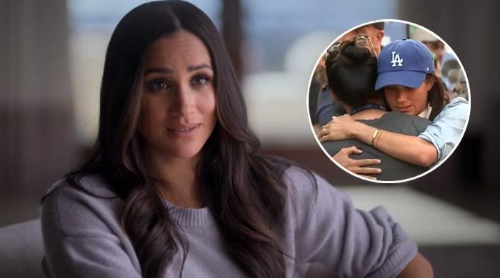 Meghan Markle decreased to tears as she hugs Los Angeles hearth sufferer