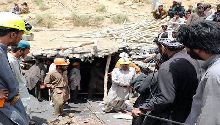 Rescue officials at the site of a collapsed mine. — Radio Pakistan/File