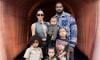 Kanye West meets kids in Japan while Kim Kardashian deals with LA wildfires