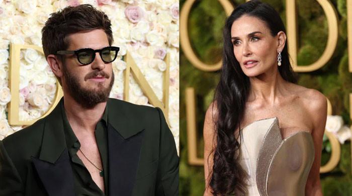 Rumors of romance are sparked by Demi Moore and Andrew Garfield.