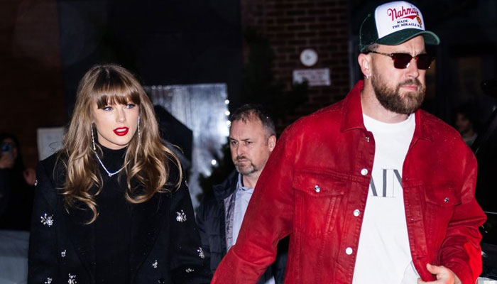 Taylor Swift and her entire family cheer on Travis Kelce at Chiefs game