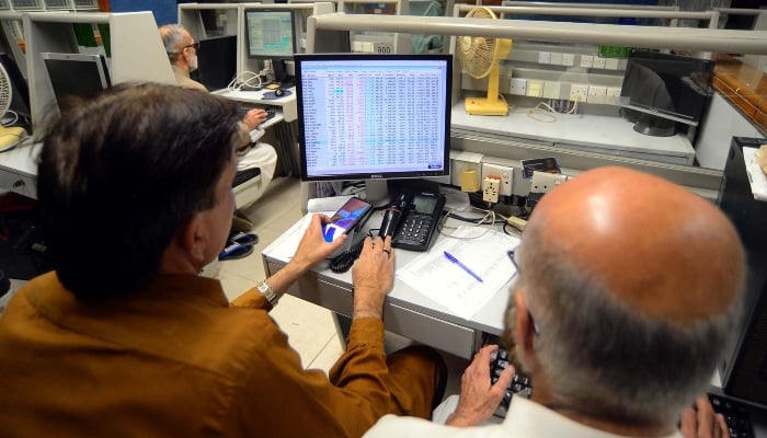 Brokers are busy in trading at Pakistan Stock Exchange (PSX) in Karachi on Friday, January 31, 2025. — PPI