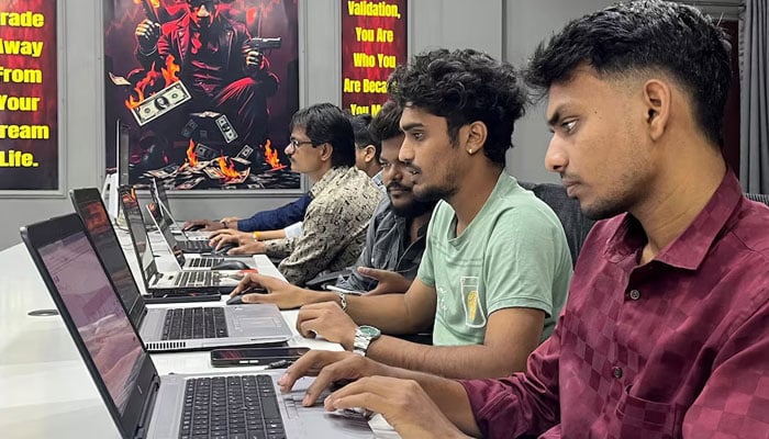 Students attend a morning class for equity and crypto trading at the Thoughts Magic Trading academy in Nagpur, India, February 14, 2025. — Reuters