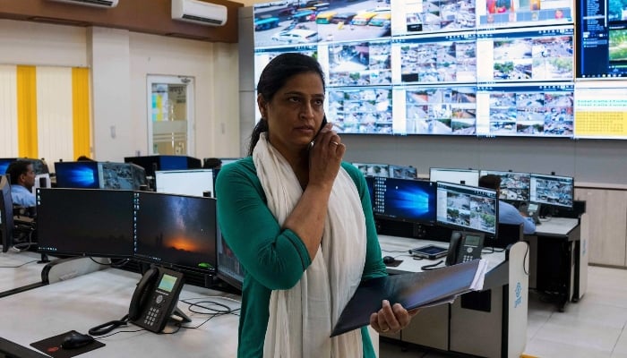 A female worker at an office. — AFP/ File