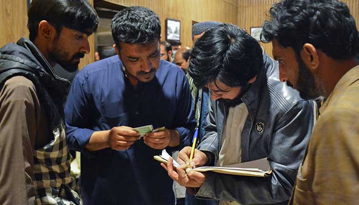 Passengers who were rescued from a train after it was attacked by militants, get themselves registered at the Railway Station in Quetta, Balochistan, March 12, 2025. — Reuters 