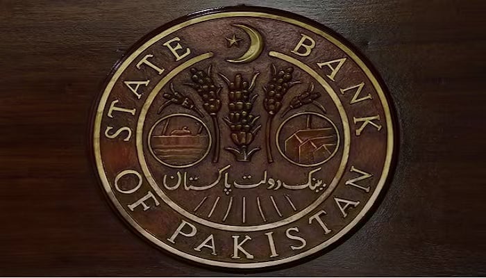 A logo of the State Bank of Pakistan (SBP) is pictured on a reception desk at the head office in Karachi, July 16, 2019. — Reuters